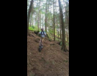 Guy offroading with scooter in mountain trips