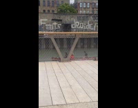 People sing and play guitar while canoeing