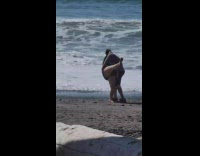 Collab IITW - Woman adjust camera timer run towards partner