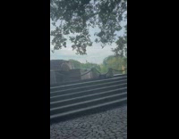 Shirtless man washes up in water fountain 