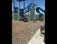 Kid jumps from high playground wall 