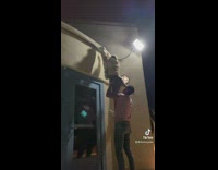 Guy helps girl get down from roof fail 