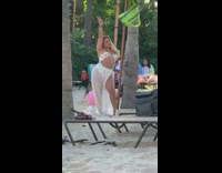 Woman bikini transparent cloth hand peace sign