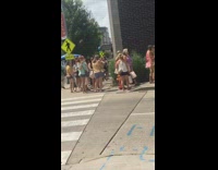 People line up white angel wings mural 