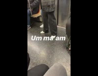 Lady wears shoplifted pants on subway