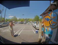 Girl blue bikini building entrance sun cctv