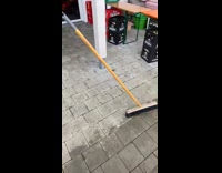 Broom on bricks stand on its own