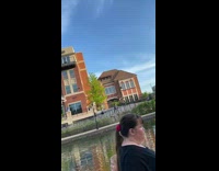 Collab IITW - Man jogs while another man films him from behind on the sidewalk