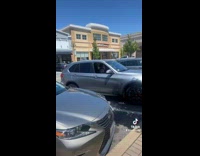 Bad parking job versus woman sleeping 