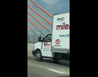 Truck driver do bicep curls dumbbell bridge