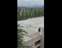 Guy black shirt vlog empty parking lot 