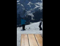Man opens the bottle with ski board