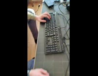 Boy use mouse keyboard to play on phone