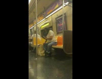 Man white shirt hold pigeon inside train