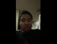 Boy jiggles his cheeks in the camera in slow motion