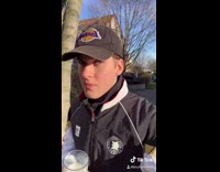 Guy drinks glass of milk in public 