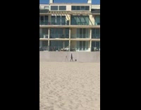 Blue bikini girl grey wall phone tripod 