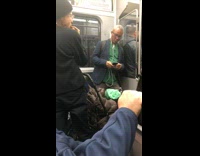 Woman subway black beanie eating bag of herbs vegetables lettuce