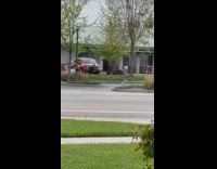 Two girls dance street jumpsuit red car
