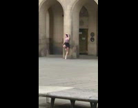 Girl skirt knee up lean on pillar