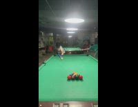 Guy play billiards make ball fly upward