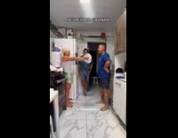 ClipsIG - Man playing like a rooster with the cover of saucepan