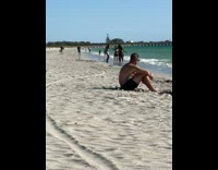 Group of Four People Dance on Beach