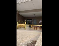 Collab ShredSlams - Guy lands on upright skateboard cement platform 