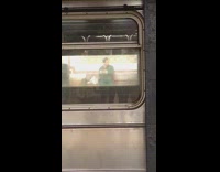 Man on other side of tracks lifting weights