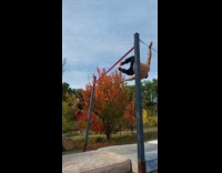 Guy swing on metal bar slow motion