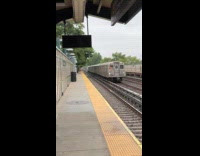 Vintage train pass by the station rain