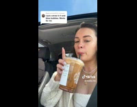 Lady Blows Bubbles to Mix Expresso Drink