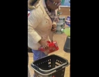 Woman has nose inhaler up in her nose 