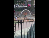 Grown man washes himself and kids water park 
