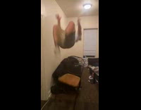 Guy backflips on chair and lands on head