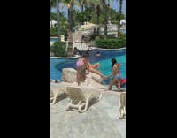 Woman orange bikini swimming pool photo shoot Part 3