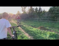 guy red jacket blue bike dirt 