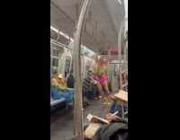 Collab Subway Creatures - Man with body paint stands on subway