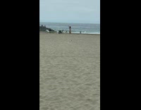 Girl bikini brown skirt dance on beach