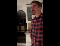 Man blows candle on the small cake