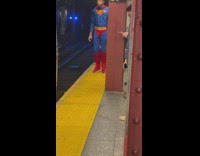 Superman tries to push train 