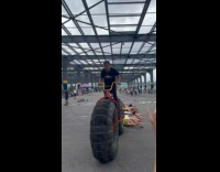 Collab WINY - Man ride over people with soft tires bicycle