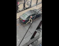 Guy stomps and kicks parking boot off tire 