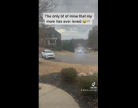 Woman dancing waving arms for jeep coming