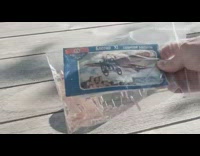 Guy assembles bleriot xi toy model airplane 