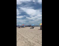 Collab WINY - Guy plays electric guitar at the beach