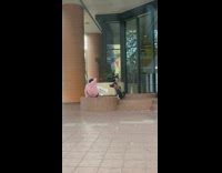 Guys have photoshoot outside building 