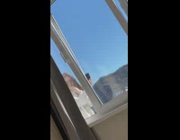 Girl tries to take selfie on balcony 