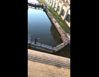 Two women narrow walkway photo shoot lake
