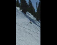 Guy riding skis rolls down mountain fail 